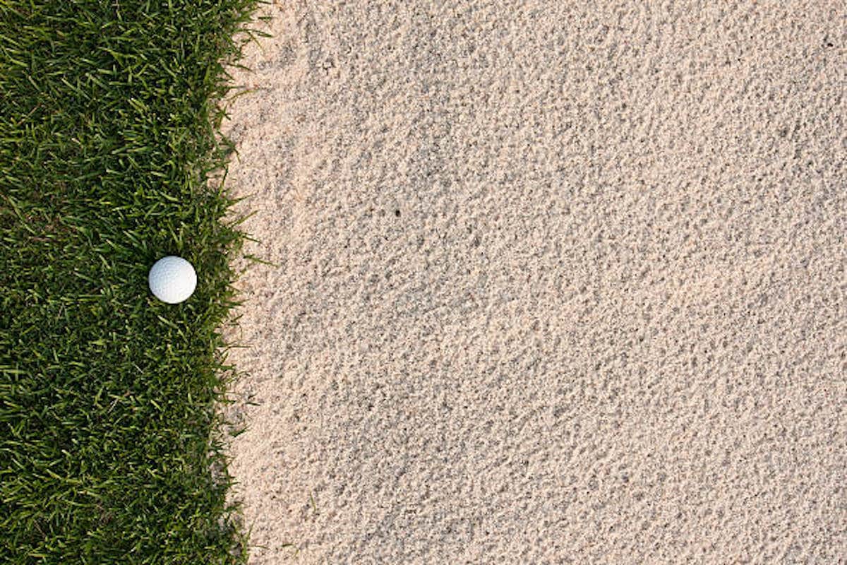 Golf ball and sand bunker